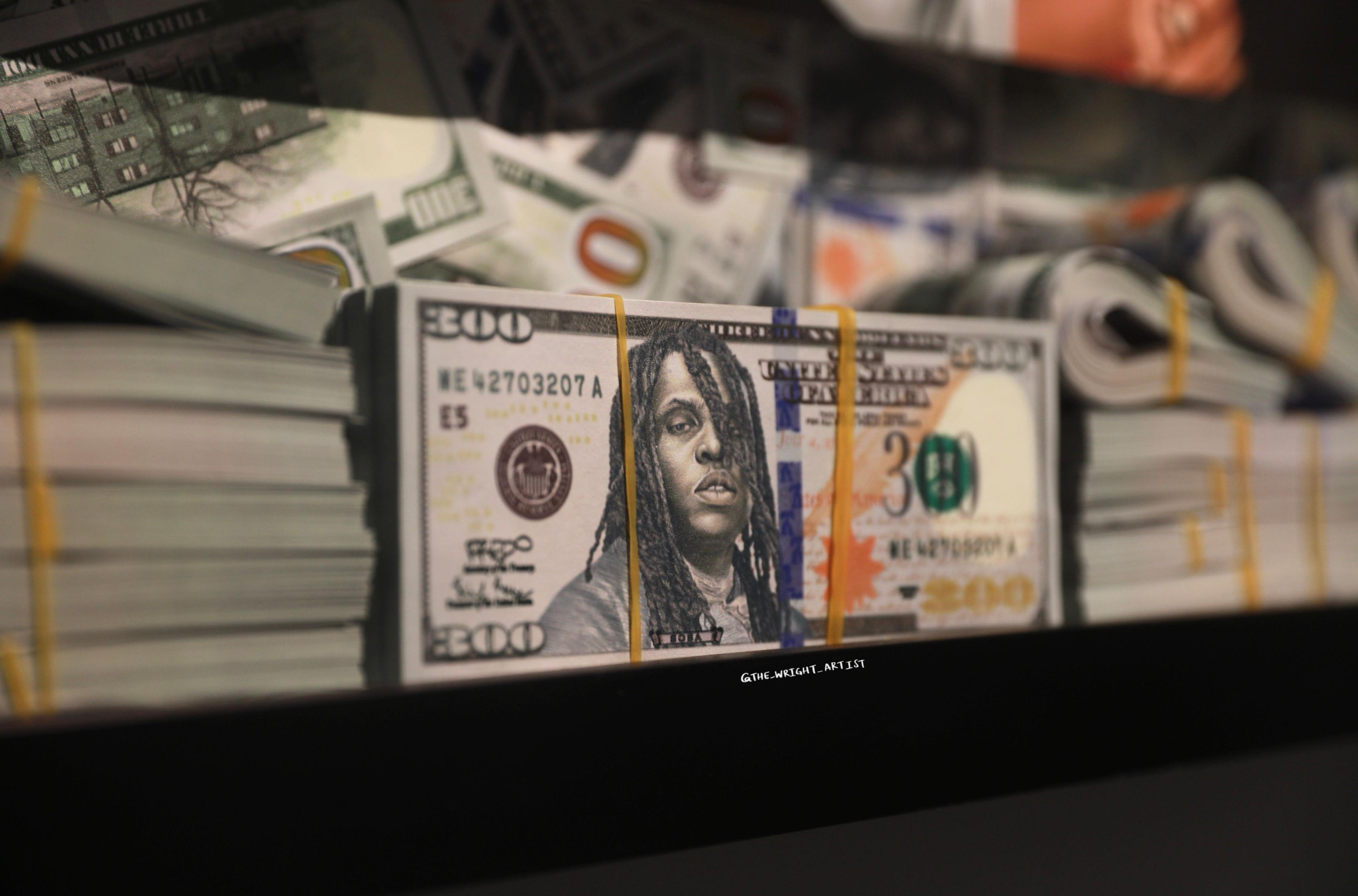 A close up of the 300 dollar bill depicting rapper Chief Keef.