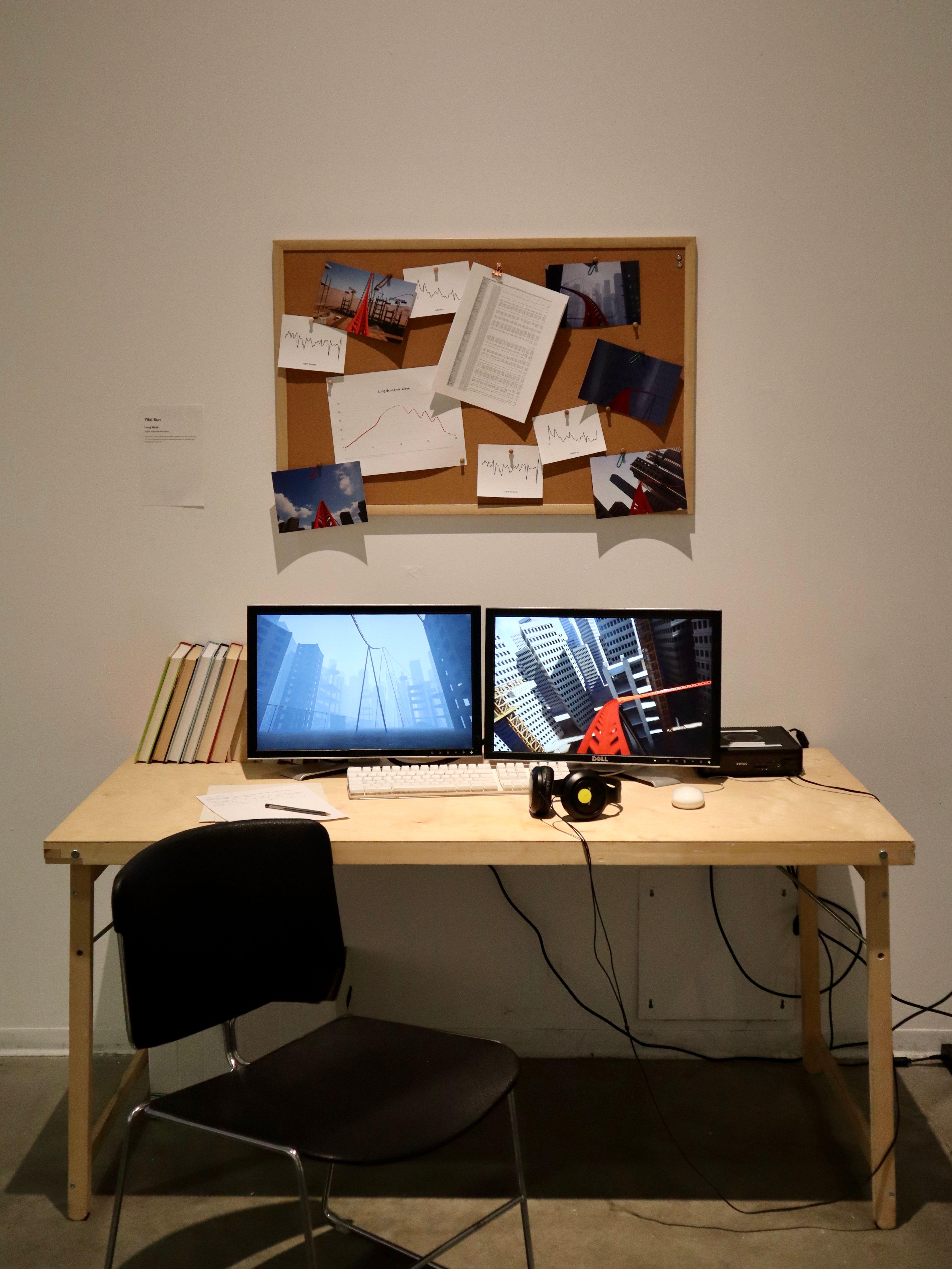 A desk with two monitors where the game is being played. Above the desk is a cork board with different images and documents fixed with pushpins.